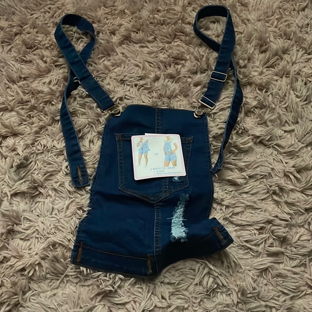 Overalls it can hook on to shorts and if u don’t want to wear u can detach it
